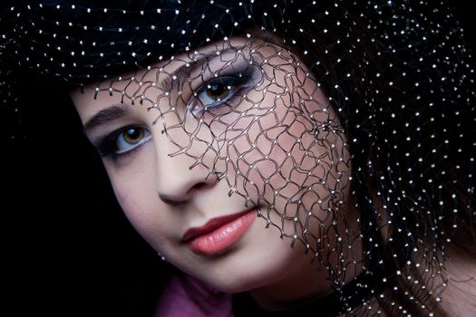 beautifull brunette , shooting in the studio with dark background 