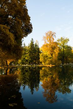 Beautiful colors of autumn landscape by the lake