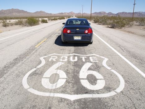Car with the famous Route 66 sign