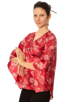 woman in red clothes welcomes people in chinese restaurant