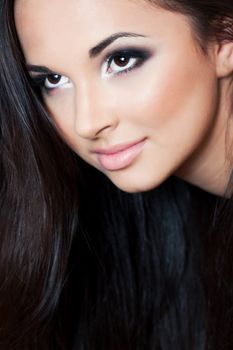 a close up portrait of a brunette beautiful girl 