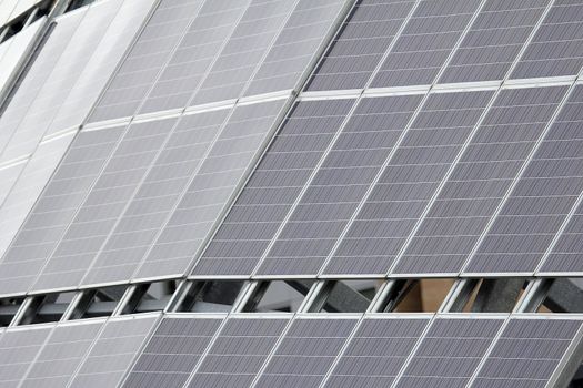 Solar Panels on Condominium Building Rooftop Background