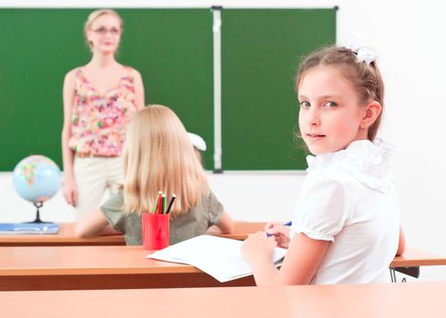 portrait of the girl in the class, the teacher tells the next school board