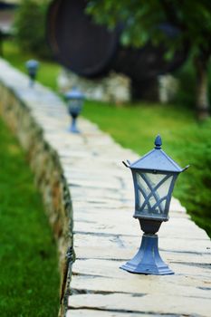 a close up picture of a lantern on the wall