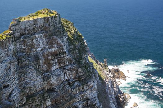 A very steep cliff at Cape Point, the place where the Atlantic Ocean meets Indian Ocean