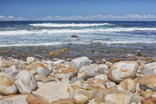 The beautiful clear waters of the Atlantic ocean with its rocky coastline near Cape Town in South Africa