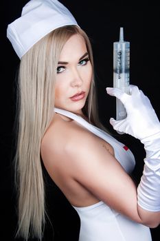 Sexy Blonde wearing a sexy white costume  
