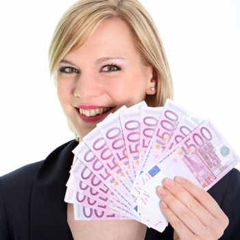 Beautiful young blonde woman holding 500 Euro notes in front of her face like a fan