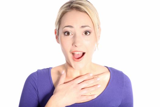 Portrait of beautiful surprised young blonde woman hand on her chest