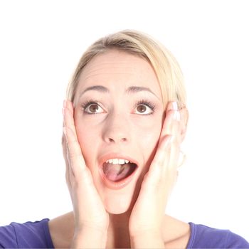 Portrait of beautiful surprised young blonde woman with hands on her face