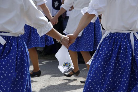 Folk dancers in hand wipes