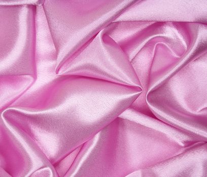 Smooth elegant pink silk can use as background 