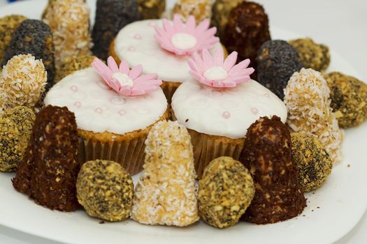 A close up picture of a plate with sweets