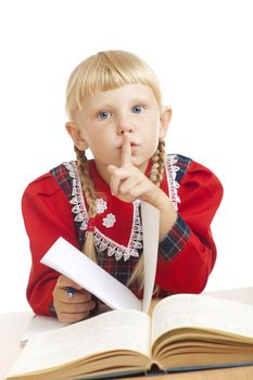 studious small girl showing silence