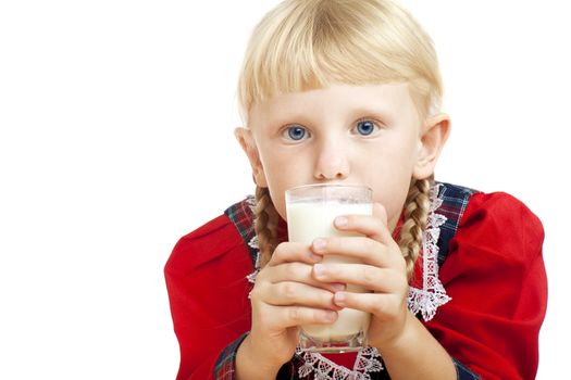 small girl drinking milk