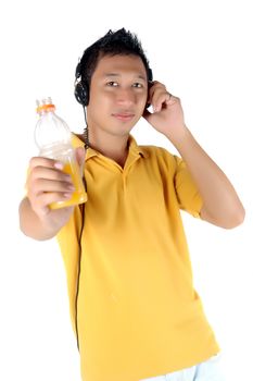 young man listening to music while brandishing his drink bottle isolated on white white background