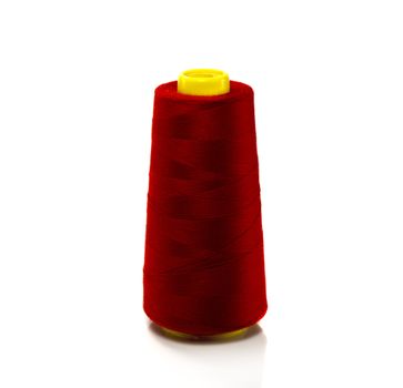 red bobbin with thread isolated on white