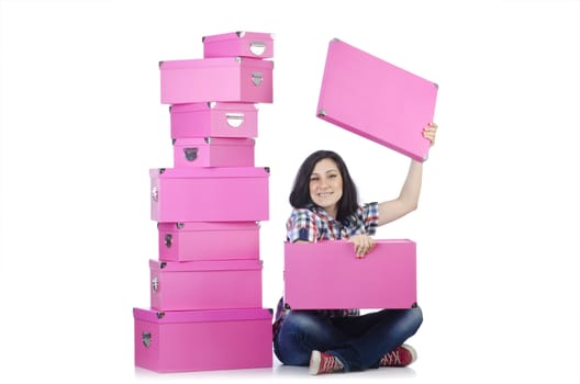 Girl with lots of gifts on white