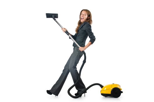Businesswoman cleaning with vacuum cleaner