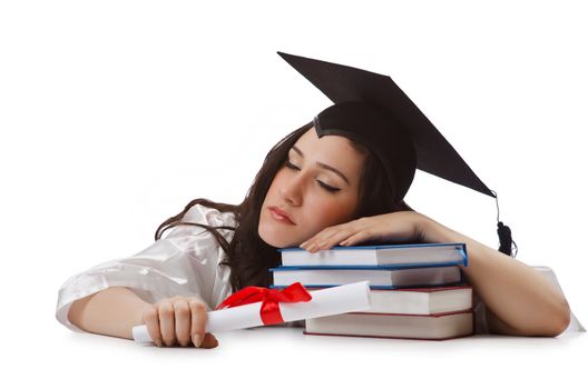 Young student with diploma on white