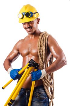 Muscular builder with tools isolated on white