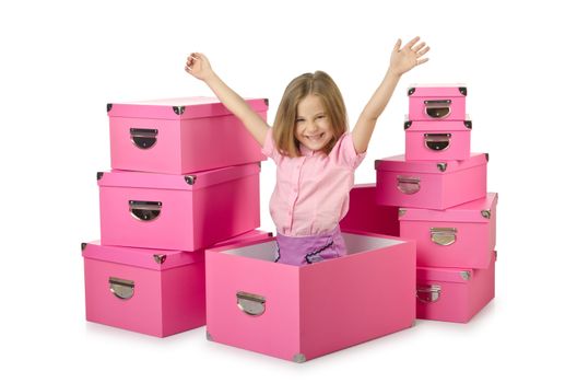 Little cute girl with lots of boxes