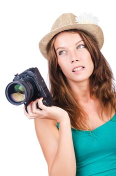 Attractive female photographer on white