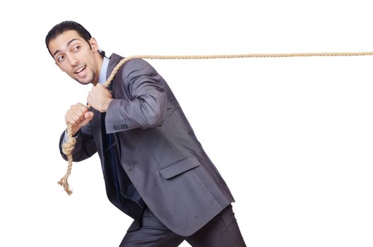 Businessman pulling rope on white