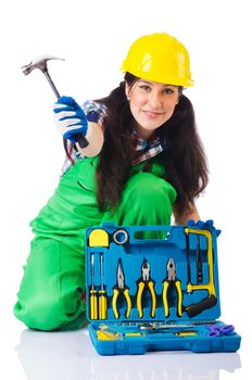 Woman with toolkit on white
