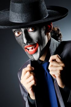 Businessman with clown face paint