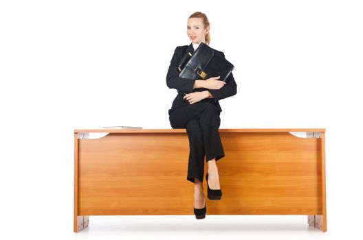 Woman businesswoman sitting on the desk