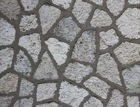 Rough gray bricks with a textured surface