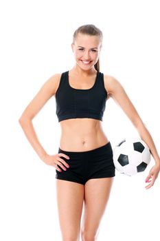 Young and sexy girl with soccer ball over white background