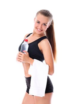 Happy woman with bottle of water and towel over white backround