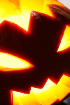 Illuminated halloween pumpkin on a black background