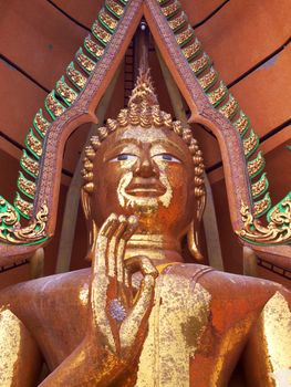 Big golden buddha statue in vitarka mudra posture, Wat Tham Sua(Tiger Cave Temple), Tha Moung, Kanchanburi, Thailand