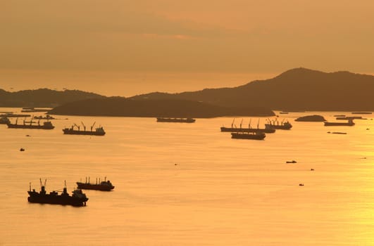 image of Cargo ship at twilight time.