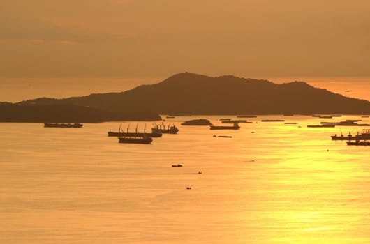 image of Cargo ship at twilight time.