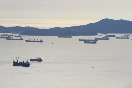 image of Cargo ship at twilight time.