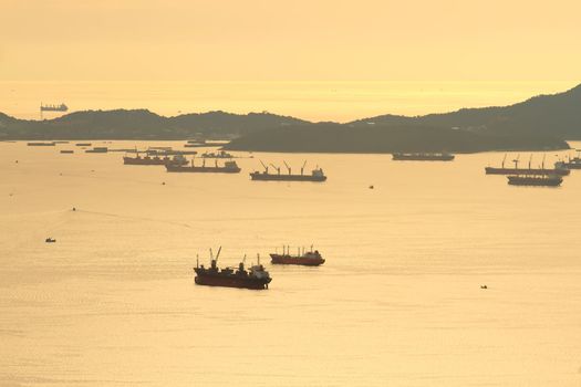 image of Cargo ship at twilight time.