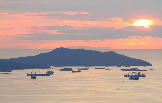 image of Cargo ship at twilight time.