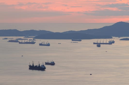 image of Cargo ship at twilight time.