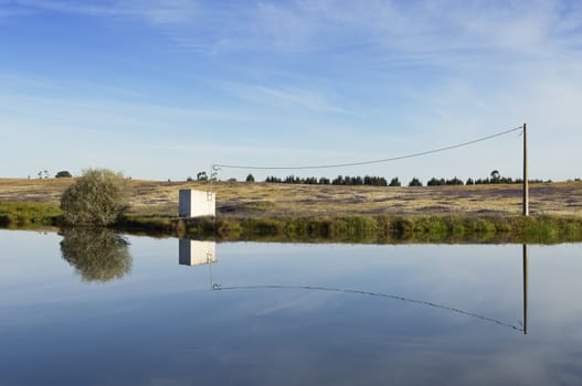 Shelter for irrigation water pump in the banks of a small pond, Alentejo, Portugal