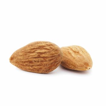 Fresh Raw almonds isolated on a white background.