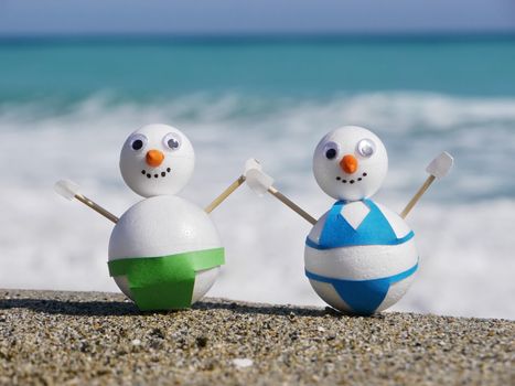 snowman beach vacation holidays from cold winter