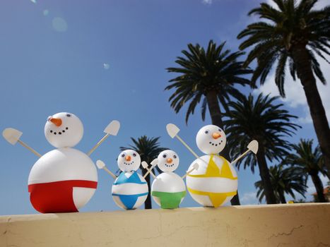 snowman beach vacation holidays from cold winter