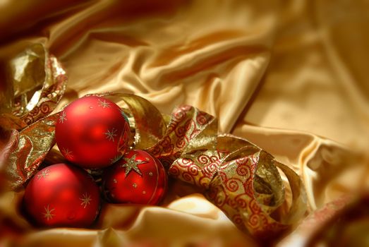Christmas balls on a gold background