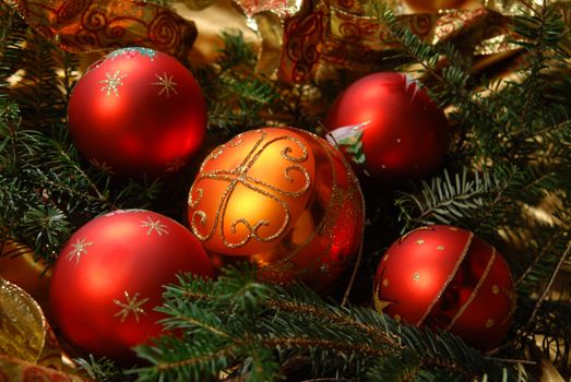 Christmas balls on a gold background