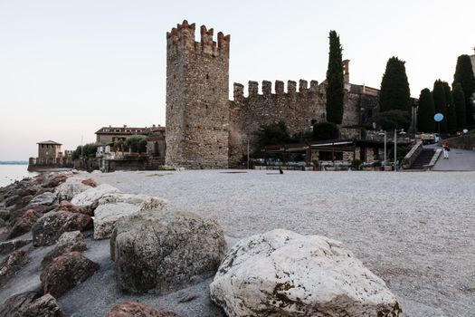 Medieval Castle on the Rocky Beach of Lake Garda in Sirmione, Northern Italy