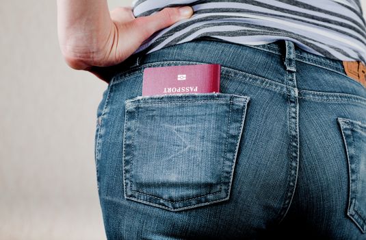 Passport in a back pocket of jeans